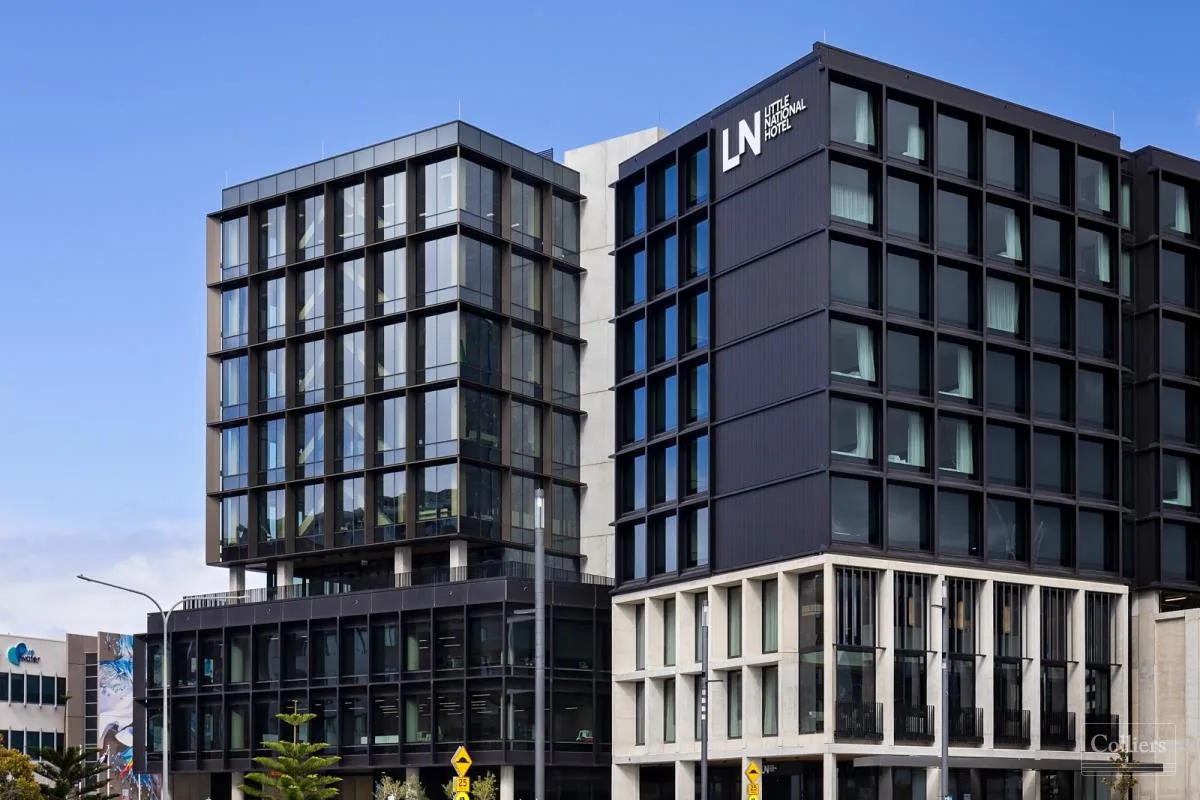 42 Honeysuckle Drive, Newcastle: the Little National Hotel building beside a glass office block